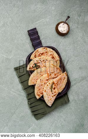 Baked Bread With Vegetable Filling On A Stone Background. Selective Focus.
