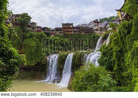 Furong, China - May 29, 2018: Furong ancient village and waterfall in Hunan.