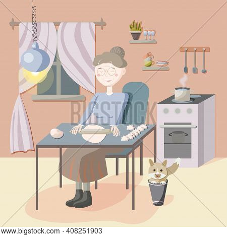 Cozy Evening Of An Elderly Woman With A Cat. The Character Of The Grandmother In The Kitchen Sits At