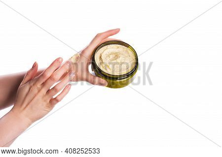 Jar Of Body Cremy Scrub For Body In Female Hand