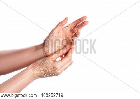 Cremy Scrub For Body On Female Hand Isolated On White