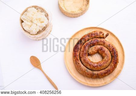 Northern Thai Sausage (sai Aua), Grilled Intestine Stuffed With Minced Pork, Spices And Herbs Eating