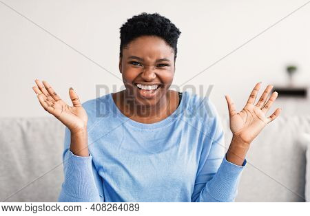 Positive Emotions Concept. Portrait Of Excited African American Woman Smiling, Laughing And Looking 