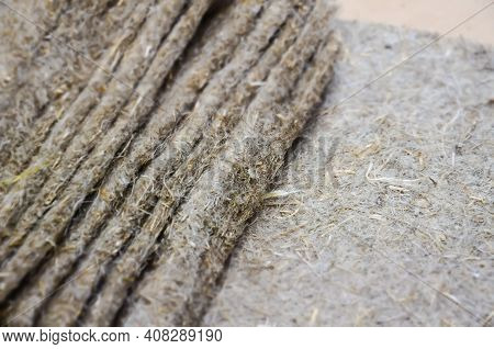 Selective Focus On Structure Of Linen Seedling Mats. Texture Of Substrate For Growing Microgreens. O