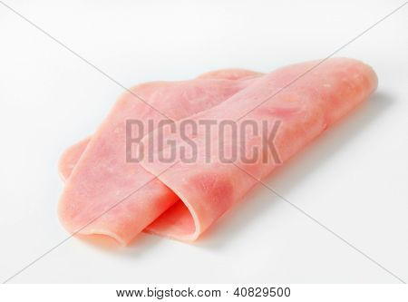 dos dobladas rebanadas de jamón