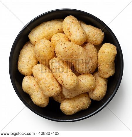 Peanut Flips In A Black Ceramic Bowl Isolated On White. Top View.