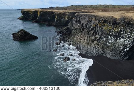 Stunning Rugged Coastline With Basalt Columns And Cliffs.