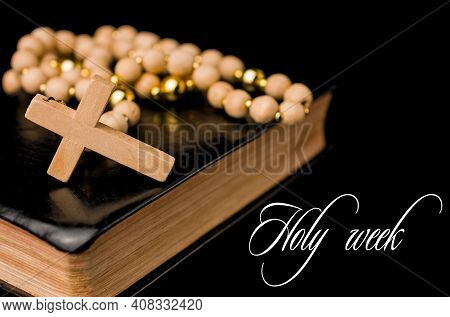 Closeup Of Wooden Christian Cross On Bible And Prayer Beads On Black.church Utensils.