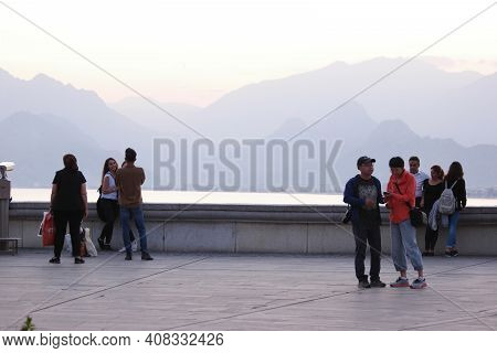 05.11.2019 - Antalya, Turkey. People Enjoying Holiday In Embankment Promenade At Turkey. Vacation An