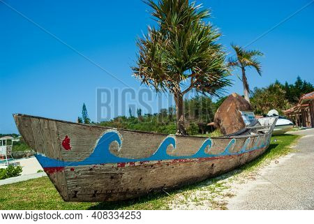 Old Wooden Harley Boat On Onna Navi Beach