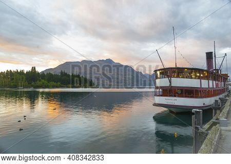 Queenstown New Zealand - March 1 2015; Vintage Tourist Boat Tss Earnslaw Parked At Pier In Township 