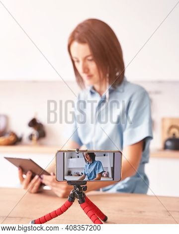 Young Woman Record Video At Kitchen. Self Portrait In Home. Blogger Selfie Video. Female Person. Lif