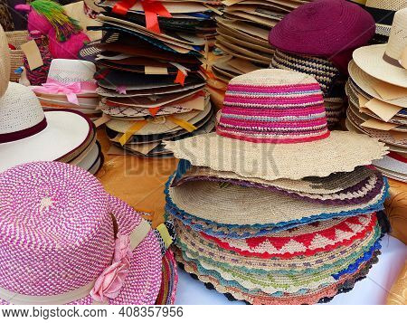 Colorful Handmade Panama Hats Or Paja Toquilla Hats Or Sombrero At The Traditional Outdoor Market In