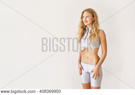 Young Pretty Woman Breathing Exercise. Home Sport Workout. Healthy Lifestyle. Long Blond Hair. Smili