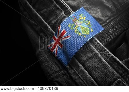 Tag On Dark Clothing In The Form Of The Flag Of The Pitcairn Islands