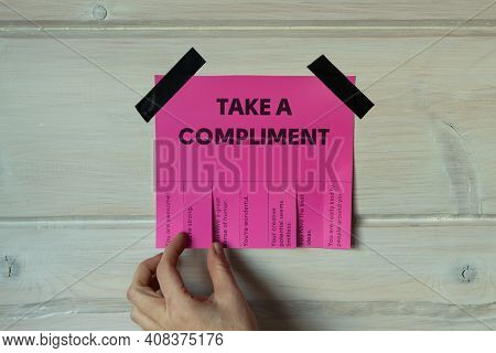 Happy World Compliment Day. Take A Compliment. Pink Wall Paper Sticker With Text Of Popular Complime