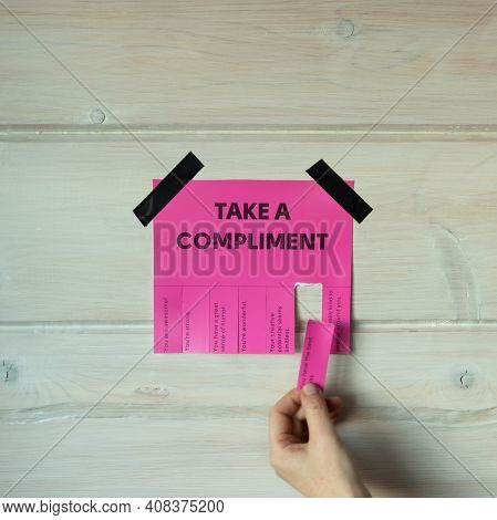Happy World Compliment Day. Take A Compliment. Pink Wall Paper Sticker With Text Of Popular Complime