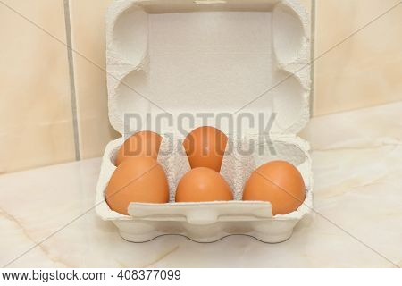Chicken Brown Fresh Raw Eggs In An Egg Box