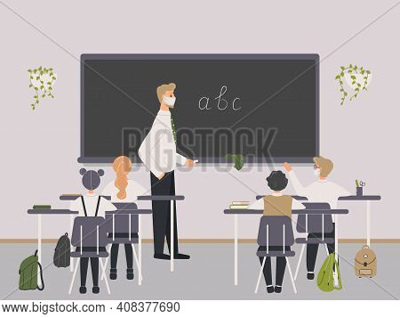 Male Teacher Of Philology In Protective Medical Mask Explaining English Letters To Elementary School