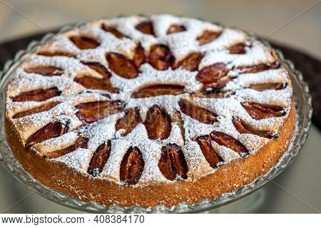 Delicious Plum Cake Sprinkled With Powdered Sugar