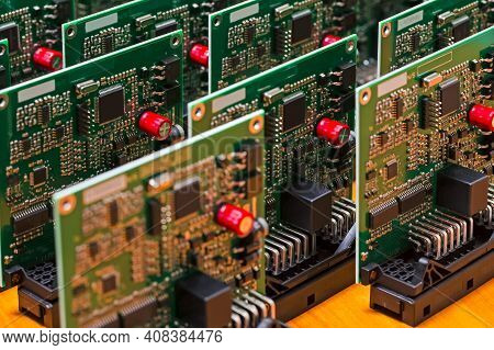 Elecronic Concepts. Stack Of Newly Produced Automotive Printed Circuit Boards With Soldered Surface