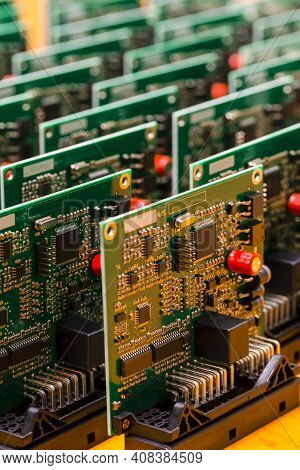 Closeup Image Of Produced Automotive Printed Circuit Boards With Soldered Surface Mounted Components