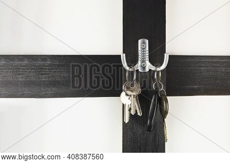 Car Keys And House Keys On A Hanger. New Reality. Car Keys On A Hook With Space For Text (copy The S