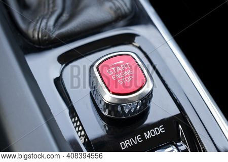 Car Dashboard With Focus On Red Engine Start Stop Button. Modern Car Interior Details. Start/stop Bu