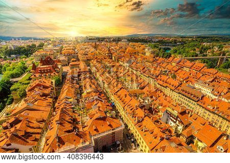 Dramatic Sunset Sky With Clouds Of Bern Old Town In Switzerland, Unesco World Heritage Site From Cat