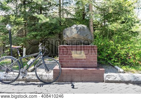 Russia, Kaliningrad, Shady Alley Street. Monument To A Meteorite. The Mammon Meteorite. A Block Of I