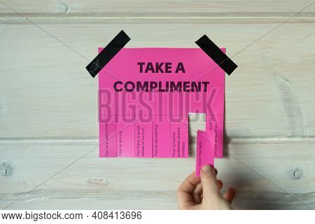 Happy World Compliment Day. Take A Compliment. Pink Wall Paper Sticker With Text Of Popular Complime