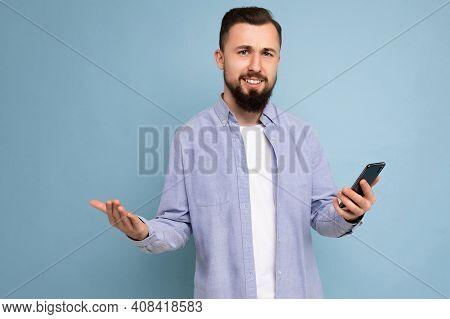 Closeup Photo Shot Of Handsome Calm Asking Good Looking Young Man Wearing Casual Stylish Outfit Pois