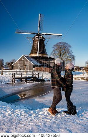 Pelmolen Ter Horst, Rijssen Covered In A Snowy Landscape Overijssel Netherlands, Historical Wind Mil