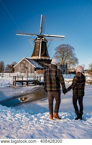 Pelmolen Ter Horst, Rijssen Covered In A Snowy Landscape Overijssel Netherlands, Historical Wind Mil