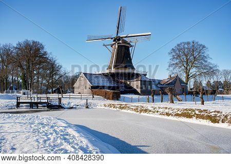 Pelmolen Ter Horst, Rijssen Covered In Snowy Landscape In Overijssel Netherlands, Historical Wind Mi