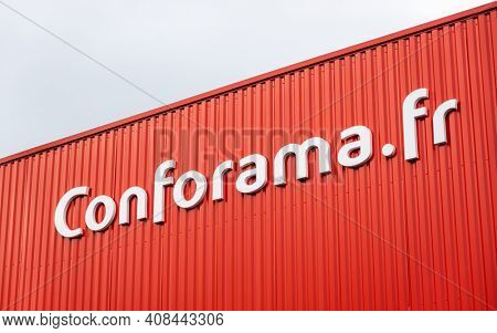 ANGLET, FRANCE - CIRCA FEBRUARY 2021: Conforama sign on red store facade. Conforama is a French home furnishings retail chain.