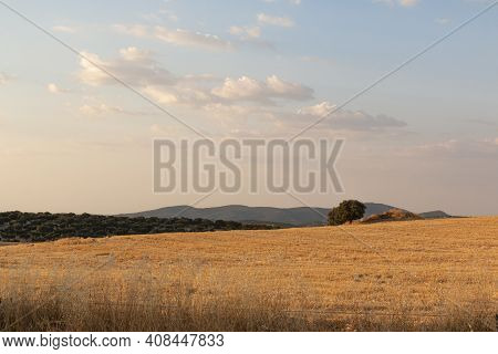 Old Chimney Of An Abandoned Factory In Southern Spain, With A Nice Blue Sky