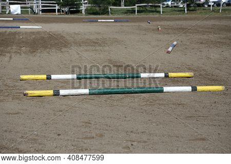 Colorful Barriers On The Ground For Jumping Horses And Riders At Riding School As A Background.obsta
