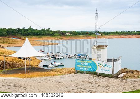 Capitólio - Mg, Brazil - December 09, 2020: Nautical Tours Area With Tourists Speed Boats In Port, T