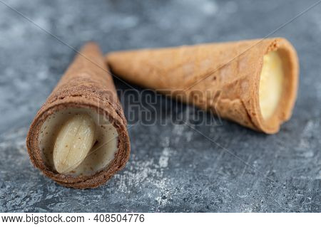 Close Up Photo Sweet Conus Caramel Candy On Grey Background