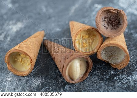 Close Up Photo Different Kinds Sweet Conus Candies On Grey Background