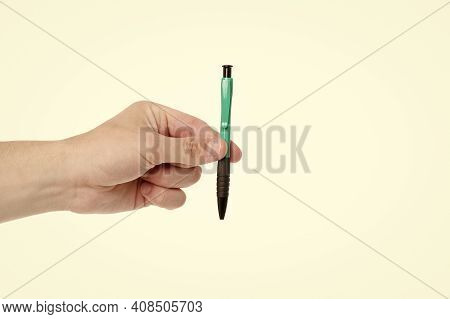 Write Down. Souvenir Concept. Hand Writing And Calligraphy. Writing Pen In Male Hand. Ballpoint Pen 
