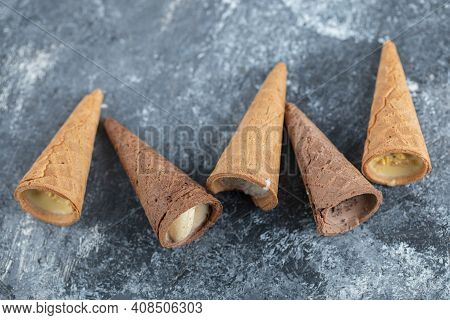 Top View Different Kinds Sweet Conus Candies On Grey Background