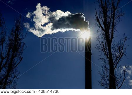 Bucharest, Romania - January 15, 2021: Chimney Of Cet Progresul Power Plant, Pollute With Smoke From