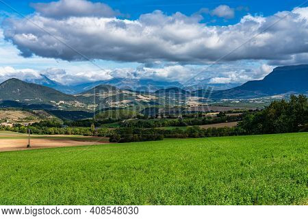 Scenic View On The Trieves Valley With The Vercors Mountain Range Near Bourg Saint Maurice Village F