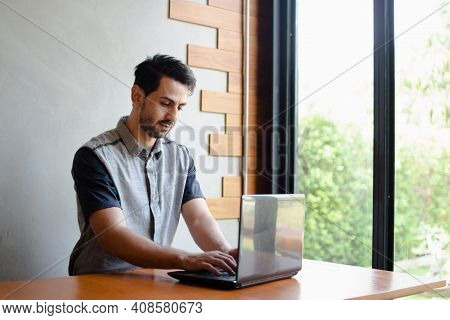 30S Caucasian White Business Man Feeling Happy Sit In Coffee Shop. Entrepreneur Handsom Male Teeth S