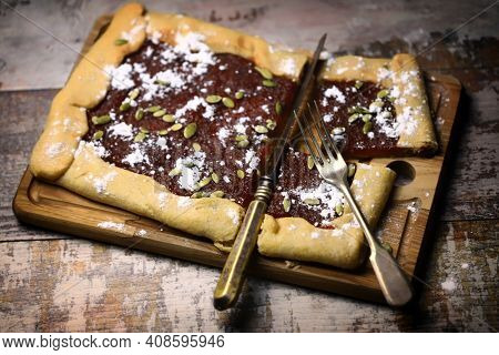 Homemade Square Galette With Confiture And Pumpkin Seeds.