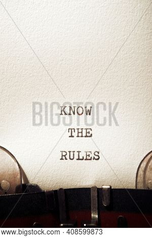 Know the rules phrase written with a typewriter.