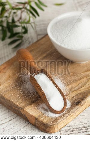 Natural Sweetener In A Wooden Spoon. Sugar Substitute. Erythritol