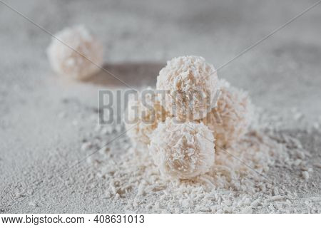 Coconut Healthy Sugarfree Balls In Coco Flakes On Light Gray White Background
